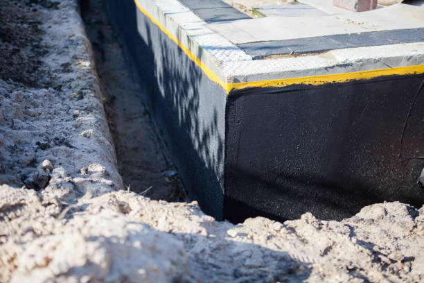 Professional Waterproofing technician working in Dearborn, MI